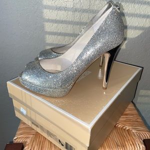 Michael Kors silver pumps